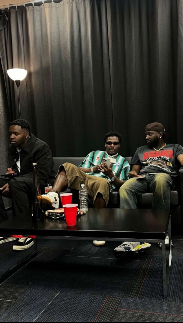 ASAKE with his creative team